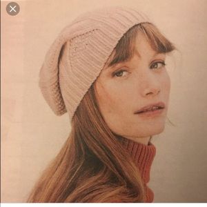 Light pink cable knit beanie